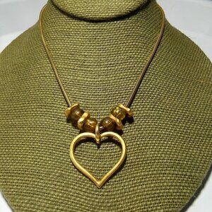 Women`s gold tone heart necklace snake chain.